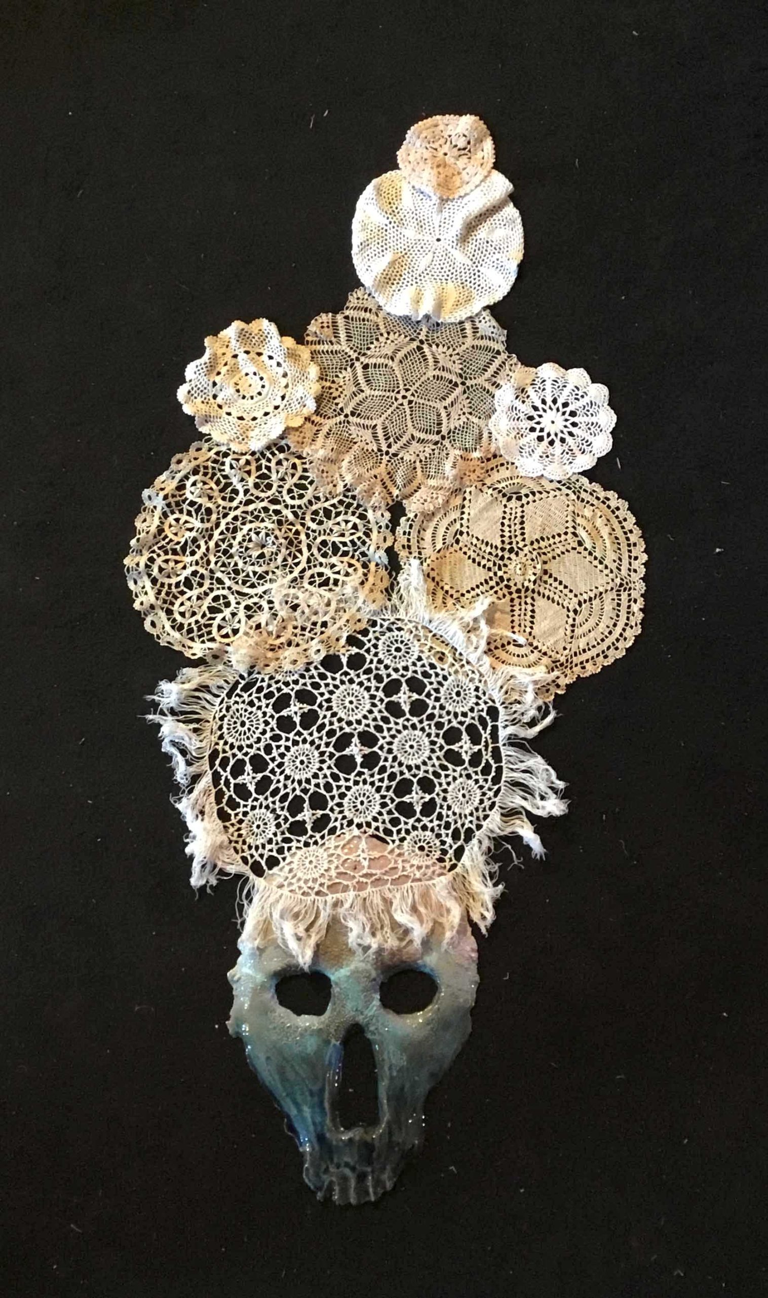 Collection: SKULL Title: YANTRA SKULL Material: ceramic and doilies Sizes Skull (cm) H: 50 - W: 35 - D: 1 Weight (g) 1500 Designed in 2020
